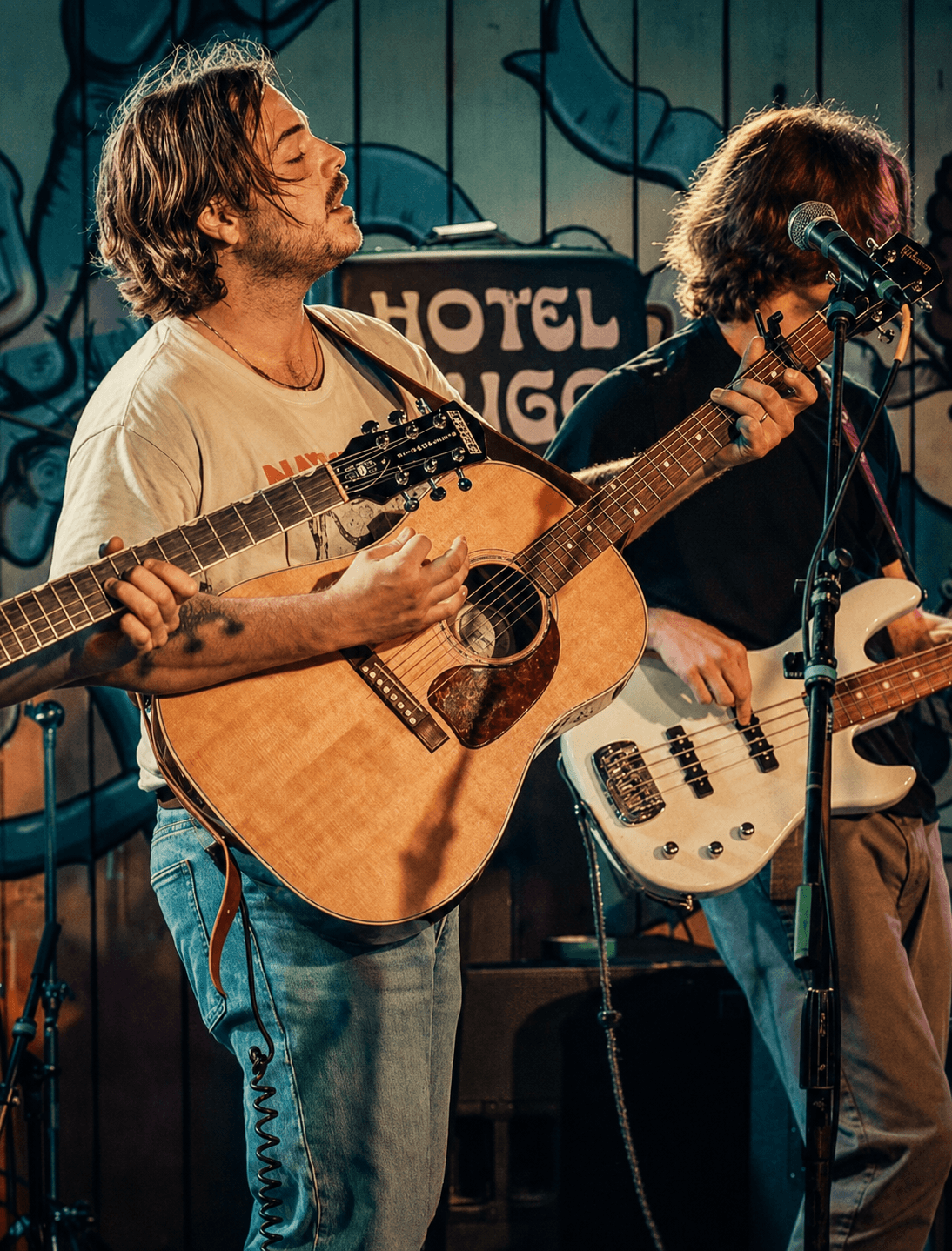 A musician performing live at Johnny's Garage